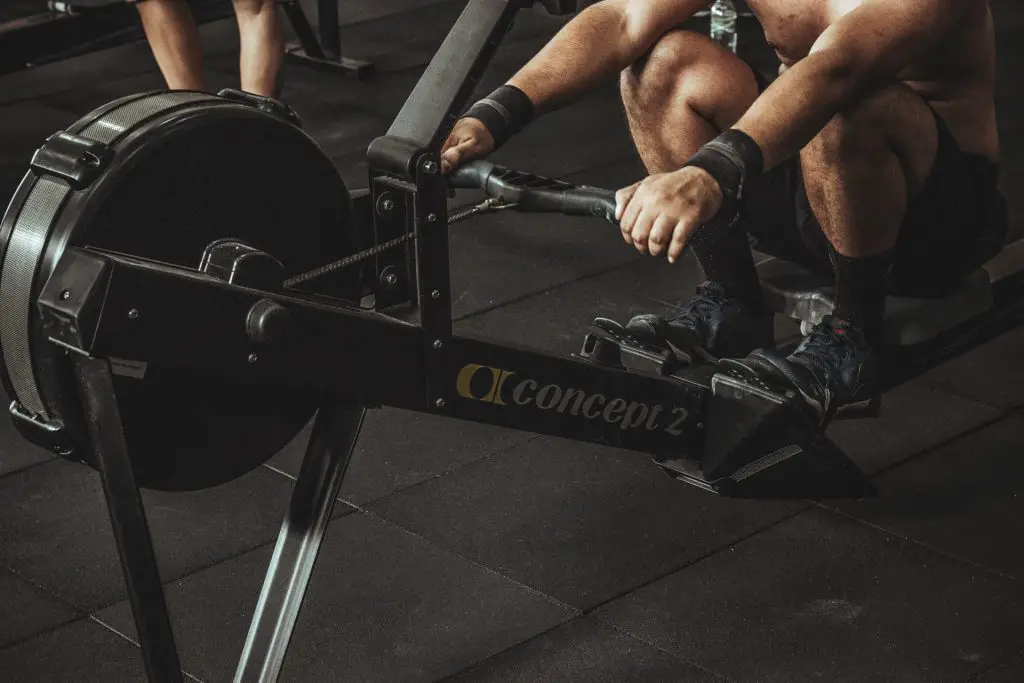 A man working out on a rowing machine