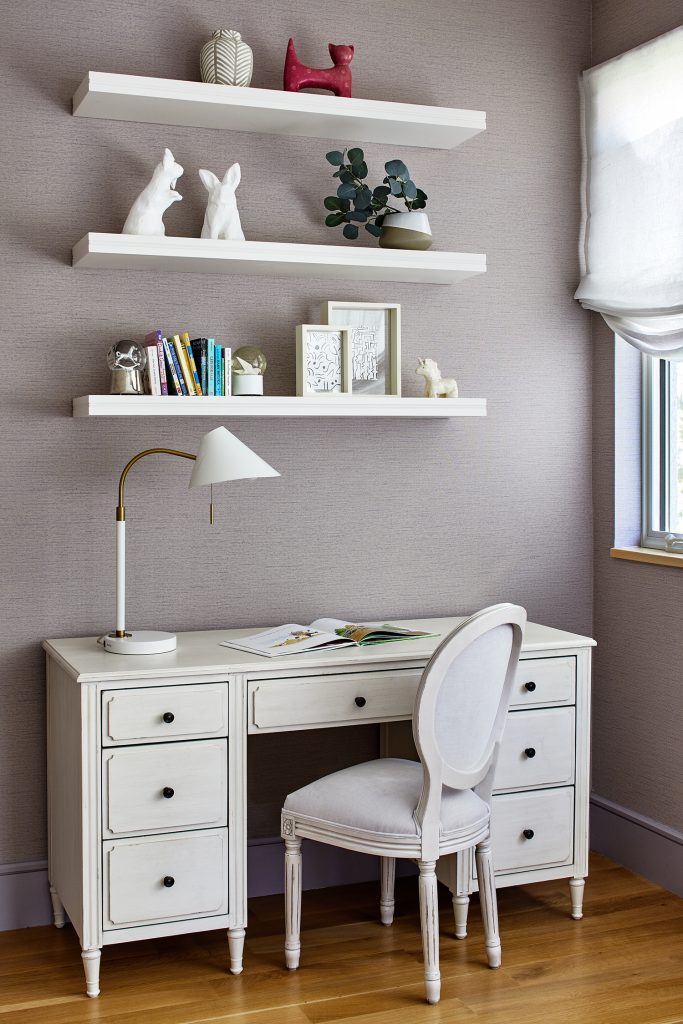 Desk and book shelfs in a home office or children's room