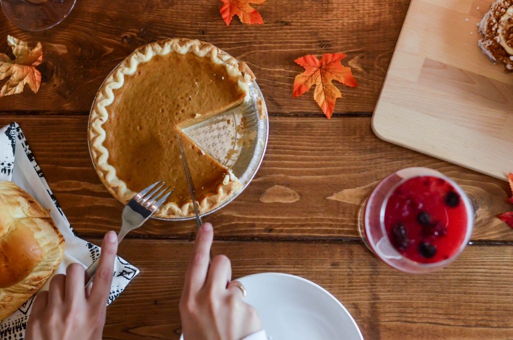 Pumpkin pie on the wooden table