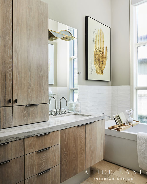 Bathroom with cabinet and bath tub