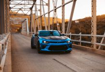 Blue Chevrolet Camaro on the bridge