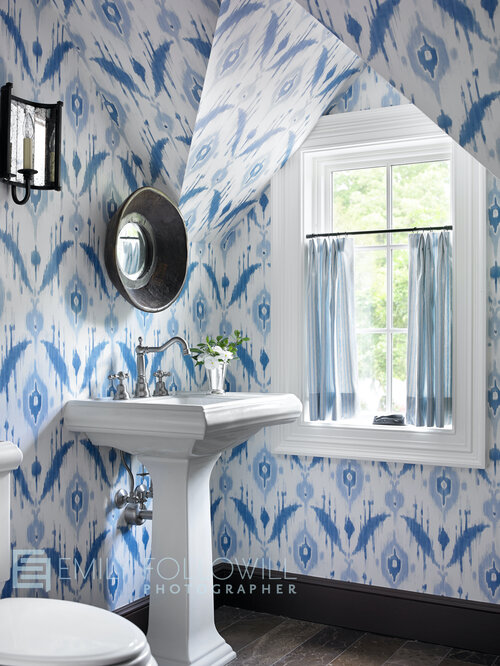 Bathroom with blue wall decorations