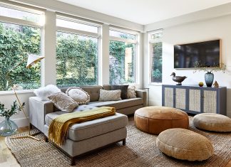 Living room with sofa and wide windows