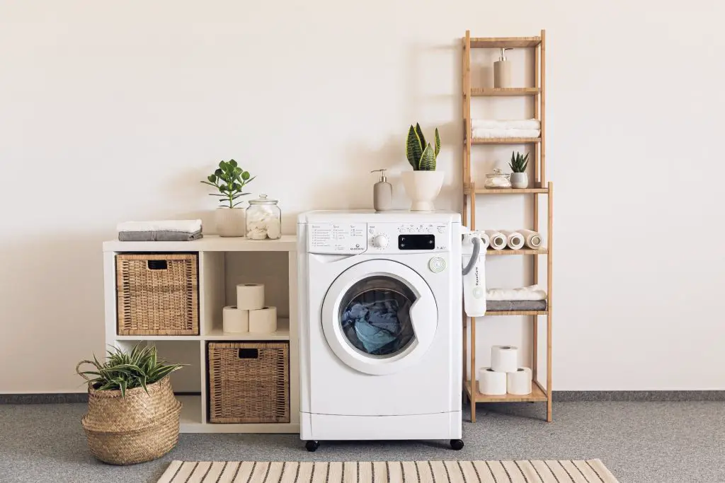 Bathroom with laundry washer