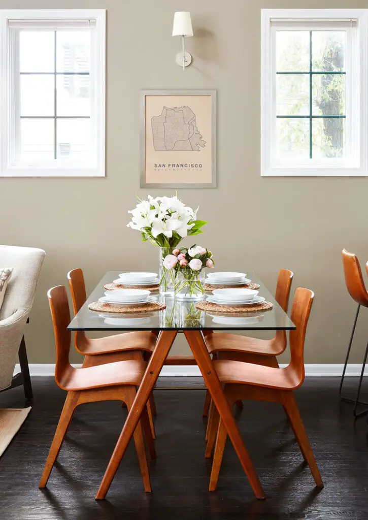 Dining table with wooden chairs and glass table