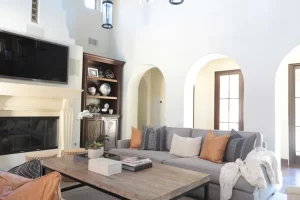 Living room with gray sofa and wide wooden coffee table