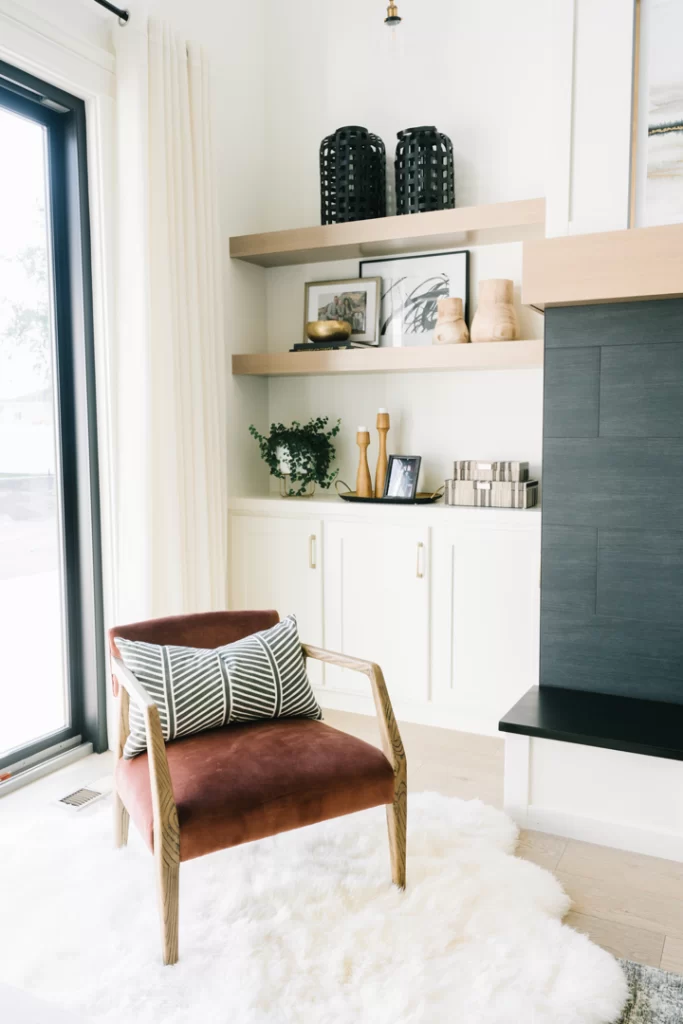 Armchair in living room beside the fireplace