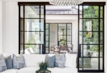 Living room with white sofa and wide windows