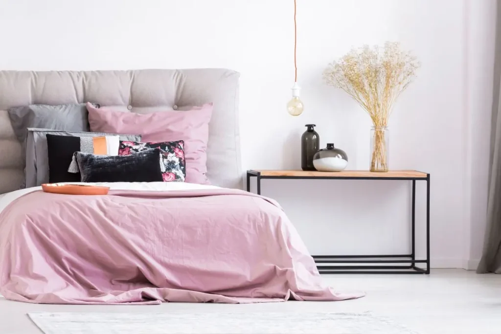 Romantic pastel pink bedroom with flowers